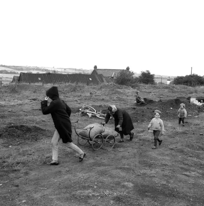 Framed Print : The people of Craghead in County Durham are taking the chance of a bit of free coal by