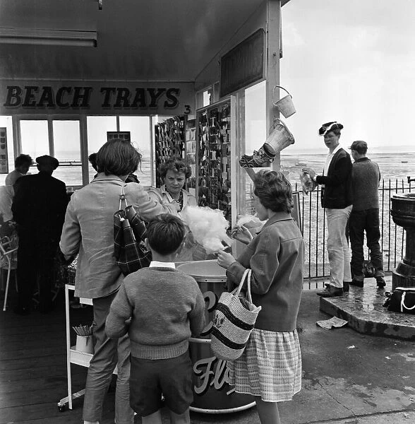 People enjoying their holidays in Southend, Essex. June 1962