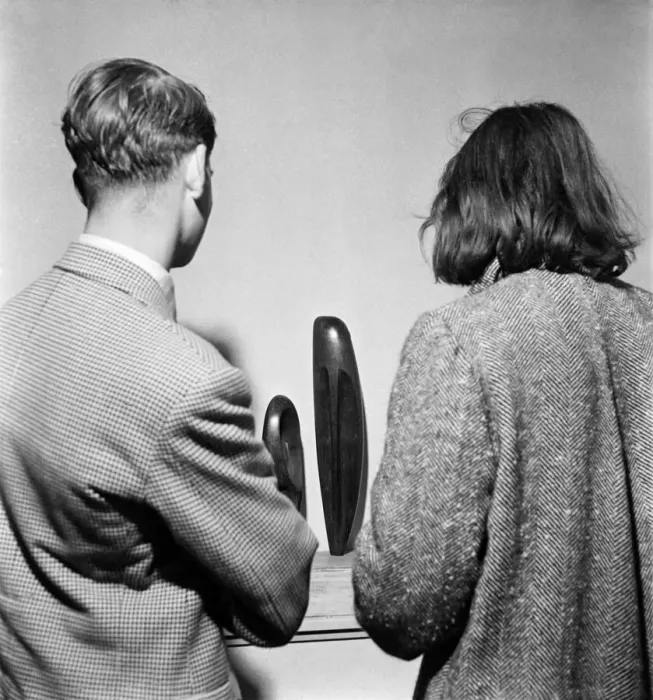 Framed Print : People examining pieces of art at the Exhibition of Sculpture at Burlington Galleries