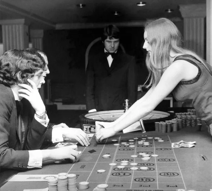 Framed Print : People gambling and playing roulette in a casino in August 1971 Framed Print : People gambling and playing roulette in a casino in August 1971