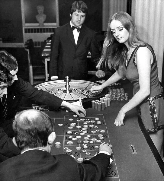 People gambling and playing roulette in a casino in August 1971