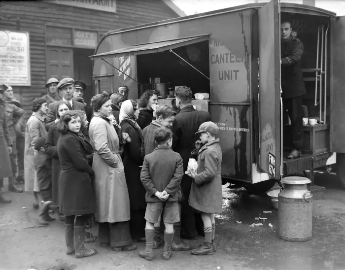 Framed Print : People gather around the mobile canteen van situated at the Salvation Army in Coventry