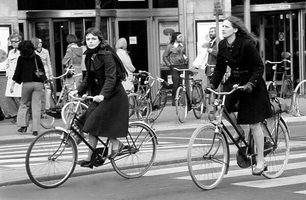 People getting around the town by bicycle in Amsterdam, Holland. May 1975