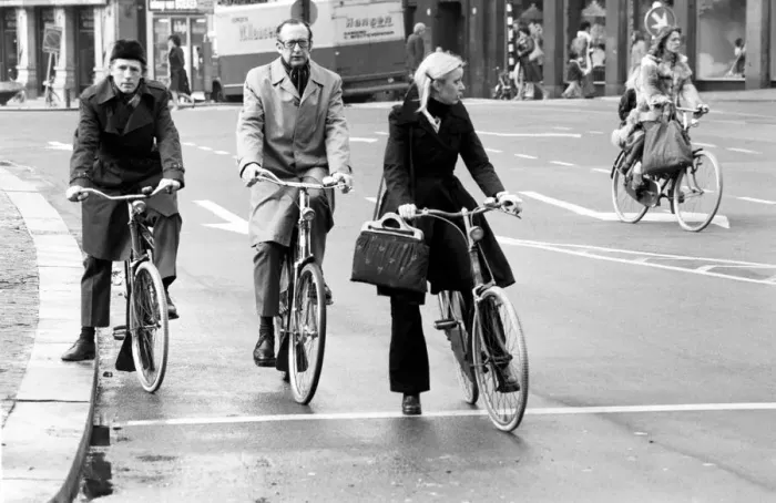 Framed Print : People getting around the town by bicycle in Rotterdam, Holland. May 1975 Framed Print : People getting around the town by bicycle in Rotterdam, Holland. May 1975