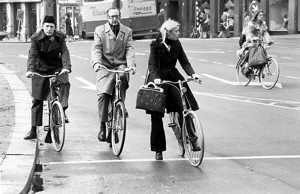 People getting around the town by bicycle in Rotterdam, Holland. May 1975