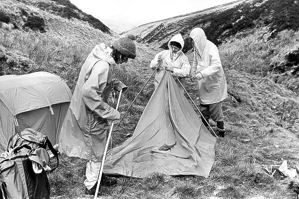 Some people learning which end of the tent is which on the Cheviots