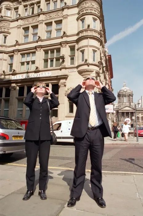 Framed Print : People in Liverpool city centre watching the solar eclipse. 11th August 1999 Framed Print : People in Liverpool city centre watching the solar eclipse. 11th August 1999