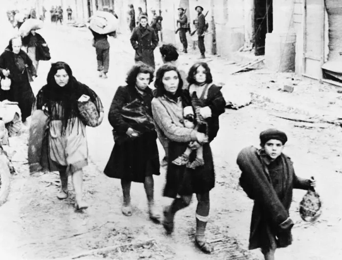 Framed Print : People of Ortona return home. A town captured by by 8th Army Canadians after days