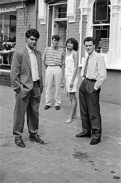 Four people outside a fashion shop in Middlesbrough. Circa 1984
