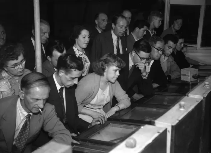 Framed Print : People playing the Twenty One Game in a Sixpenny Casino stall in Blackpool