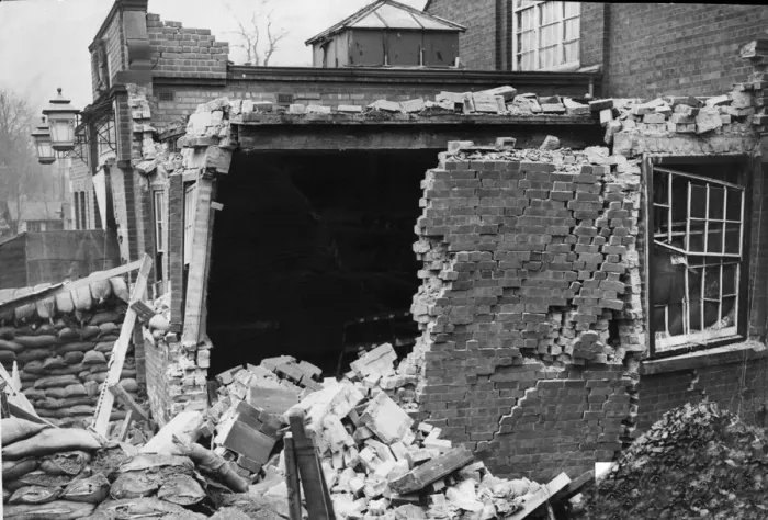 Framed Print : Several people were slightly injured when a bomb struck the corner of Kings Heath public