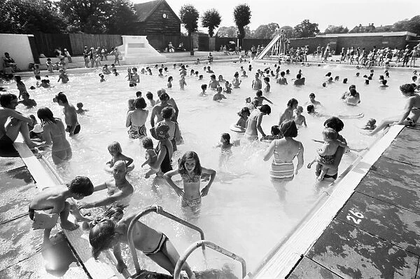 People try to keep cool at a Birmingham lido during the summer heatwave of 1976