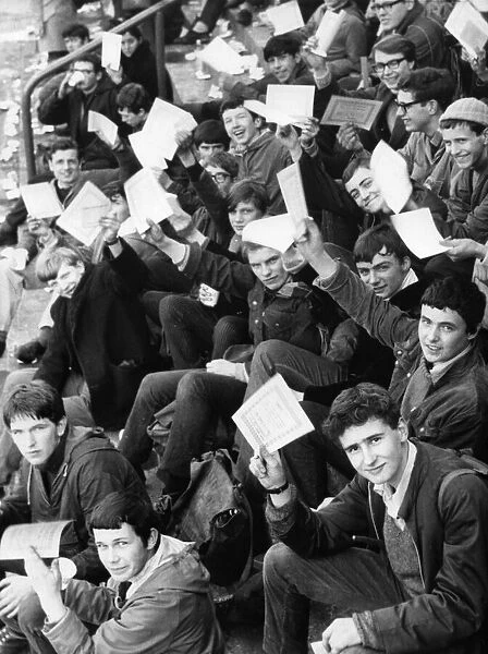 People wait at the srart of the Oxfam Walk with their entry forms on 5th May 1967