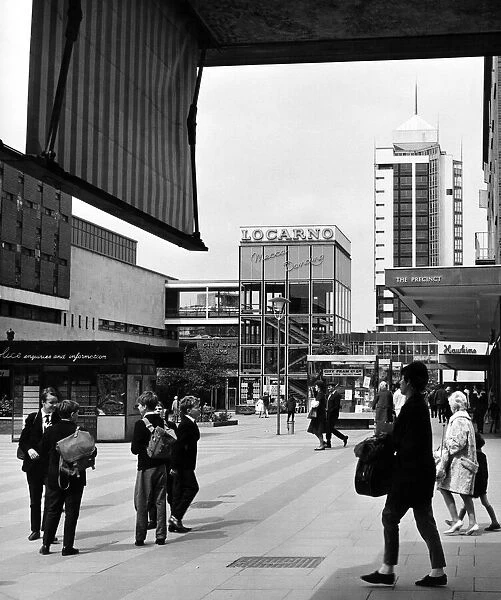 People walking past the shops in Smithford Way, Coventry. 17th July 1965