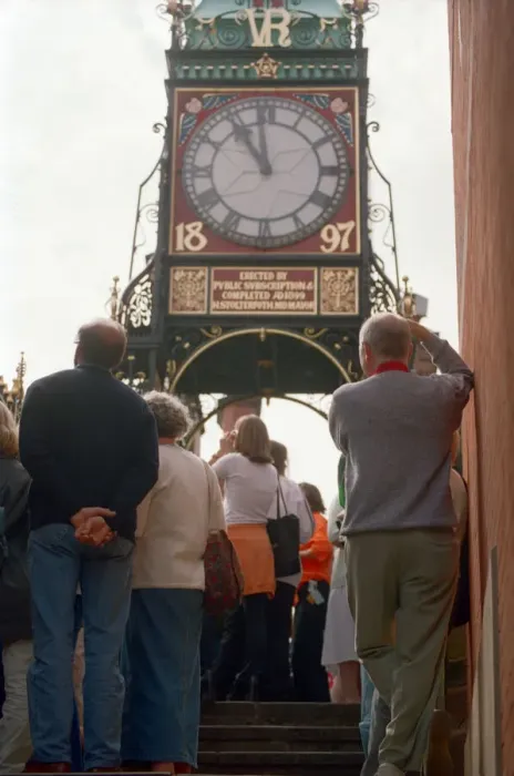 Framed Print : People watching the solar eclipse at the Eastgate and Eastgate Clock in Chester