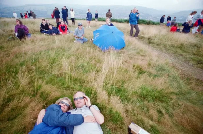 Framed Print : People watching a total solar eclipse, Caerphilly mountain. 11th August 1999 Framed Print : People watching a total solar eclipse, Caerphilly mountain. 11th August 1999