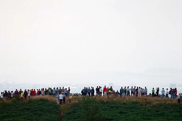 People watching a total solar eclipse, Caerphilly mountain. 11th August 1999