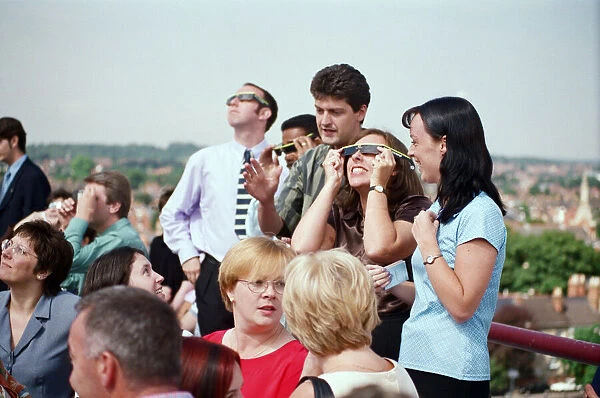 People watching a total solar eclipse at the Civic Centre, Reading. 11th August 1999