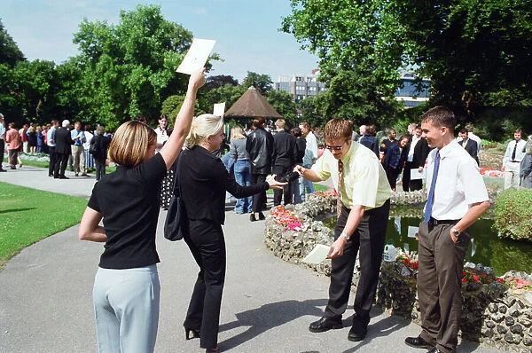 People watching a total solar eclipse at Forbury Gardens, Reading. 11th August 1999