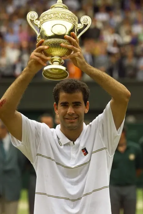 Framed Print : Pete Sampras lifts trophy after winning Wimbledon title 1999 against Andre Agassi in Framed Print : Pete Sampras lifts trophy after winning Wimbledon title 1999 against Andre Agassi in