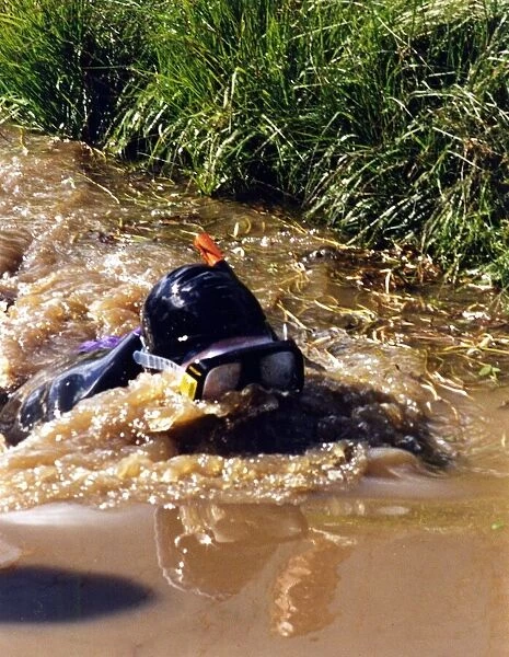 Peter Beumont from Llandaff, Cardiff, in action during his bog snorkling record bid