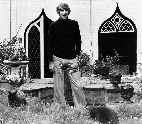 Peter Cook comedian actor outside house 1975