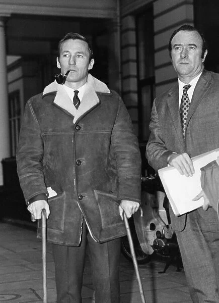 Peter Dobing (left) leaves FA headquarters after a disciplinary hearing with boss Tony