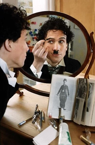 Peter Duncan actor getting ready for his part as Charlie Chaplin make-up