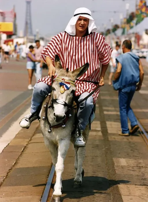 Framed Print : Peter Howitt Actor riding on a donkey A©Mirrorpix