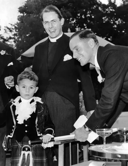 Framed Print : Peter May, is here seen Autographing a cricket bat for Young Charles Douglas, Aged 6 Framed Print : Peter May, is here seen Autographing a cricket bat for Young Charles Douglas, Aged 6