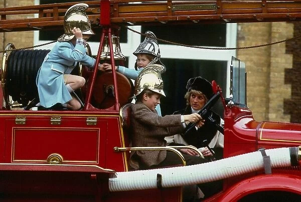 Peter Phillips January 1988 sitting at wheel of old fashioned fire engine at