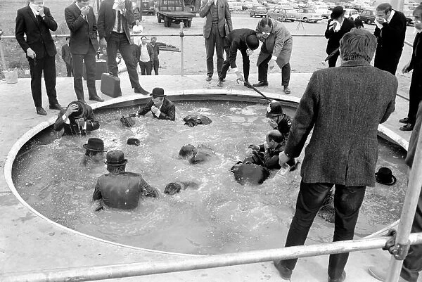 Peter Sellers Filming. Bowler hatted gents at the Sceptic money pool