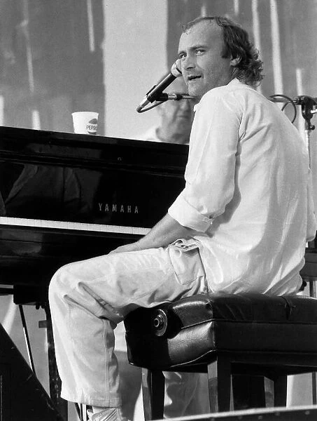 Phil Collins pop singer at Live Aid Concert 1985 JFK Stadium Philadelphia