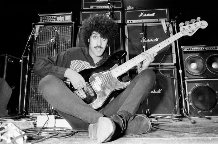 Framed Print : Phil Lynott of Thin Lizzy during a recording session for the groups new album Framed Print : Phil Lynott of Thin Lizzy during a recording session for the groups new album