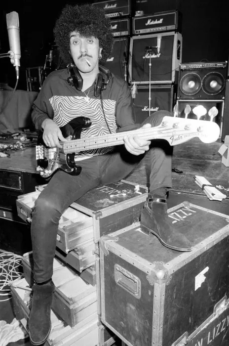 Framed Print : Phil Lynott of Thin Lizzy during a recording session for the groups new album Framed Print : Phil Lynott of Thin Lizzy during a recording session for the groups new album