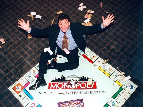 Phil Middlemiss with the Newcastle and Gateshead edition of Monopoly