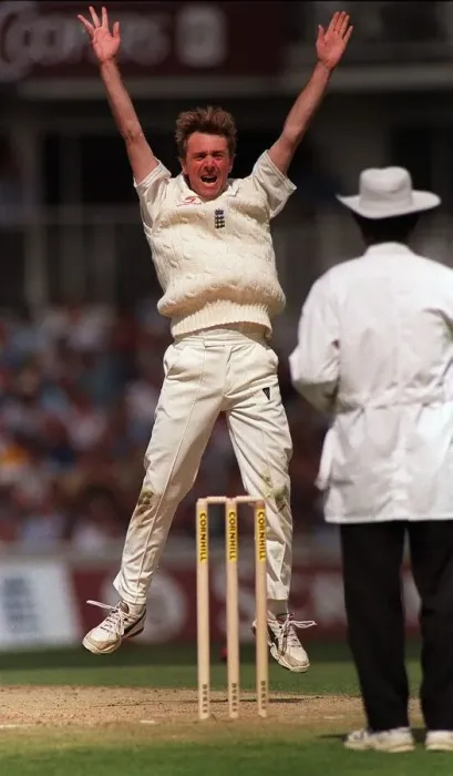 Framed Print : Phil Tufnell of England aug 1999 leaps into the air after taking the wicket of Framed Print : Phil Tufnell of England aug 1999 leaps into the air after taking the wicket of