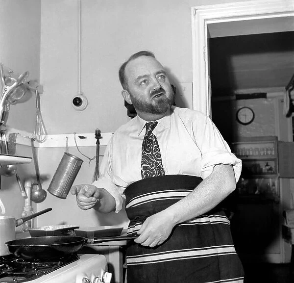 Philip Harben, T. V. cook. December 1953 D7320-001