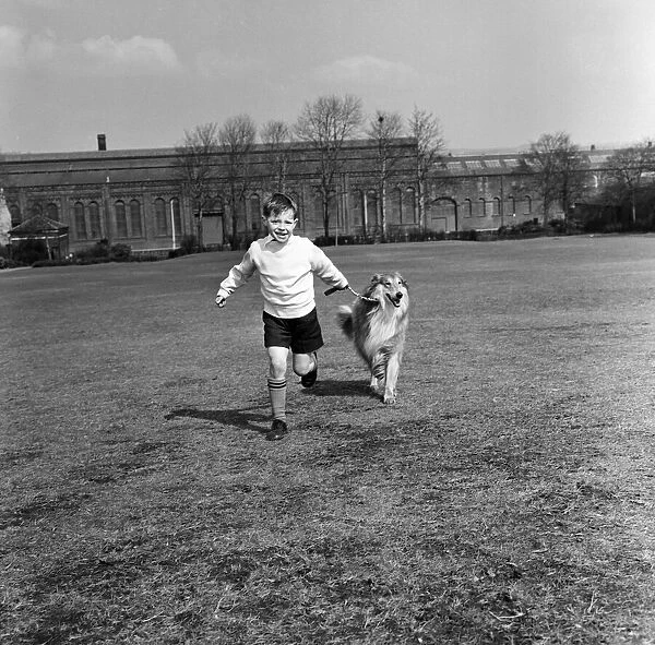 Philip Turner with his dog Rex. 9th April 1963