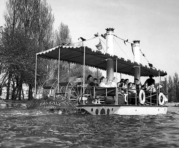 The Phoenix, home-made Mississipi river boat, on the lake in Barking, Essex