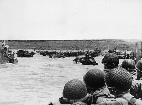Photo taken from an American landing craft approaching a beachhead oh the northern coast