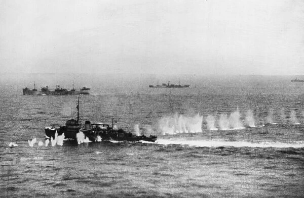 Photograph recording a phase in a successful torpedo attack by Beaufighters of RAF