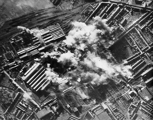 Photograph taken during a daylight attack on the steel and engineering works of the Cie