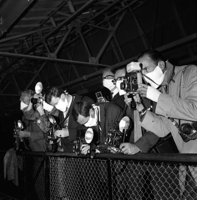 Framed Print : Photographers wearing surgical masks as they take pictures of a baby Orang Utan called Framed Print : Photographers wearing surgical masks as they take pictures of a baby Orang Utan called