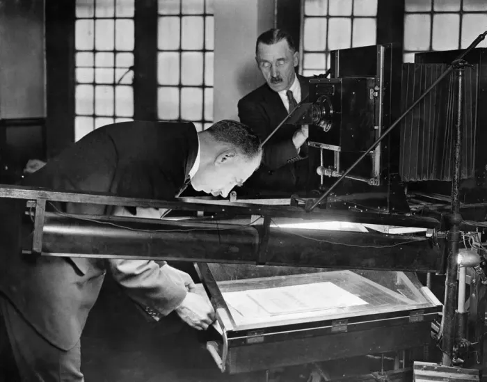 Framed Print : Photographing documents at Scotland Yard. London. May 1929