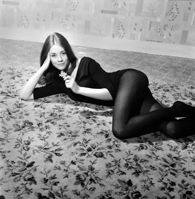 Framed Print : Picture of professional model Miss Jan De Fraine, aged 21 lying down wearing black top