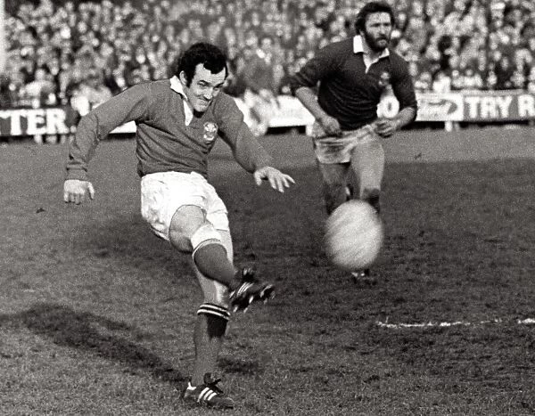 PICTURE SHOWS: FAMILIAR SIGHT: Phil Bennett in action for Llanelli with Ray Gravell in