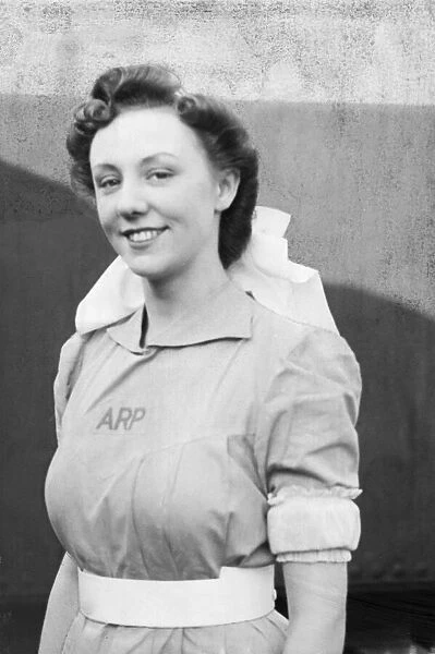 Picture shows a female ARP Warden in World War Two. The picture is from The Hull Daily