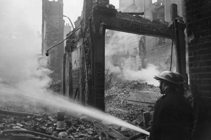 Framed Print : Picture shows firemen controlling the smoulders after another fire broke out in an air Framed Print : Picture shows firemen controlling the smoulders after another fire broke out in an air