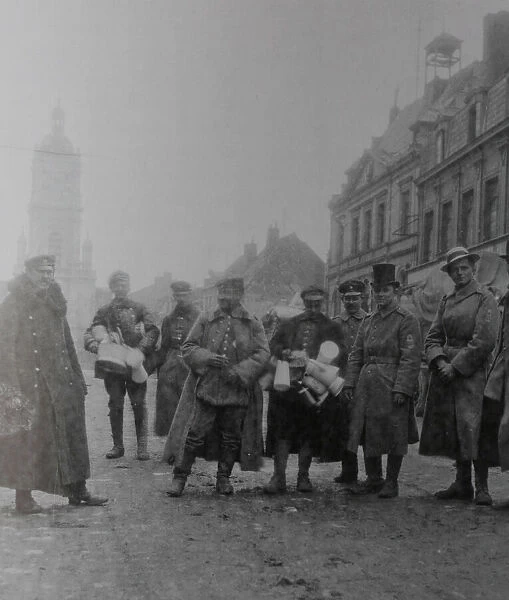 Picture shows German soldiers in Lens in 1915 standing in the main street by the Town
